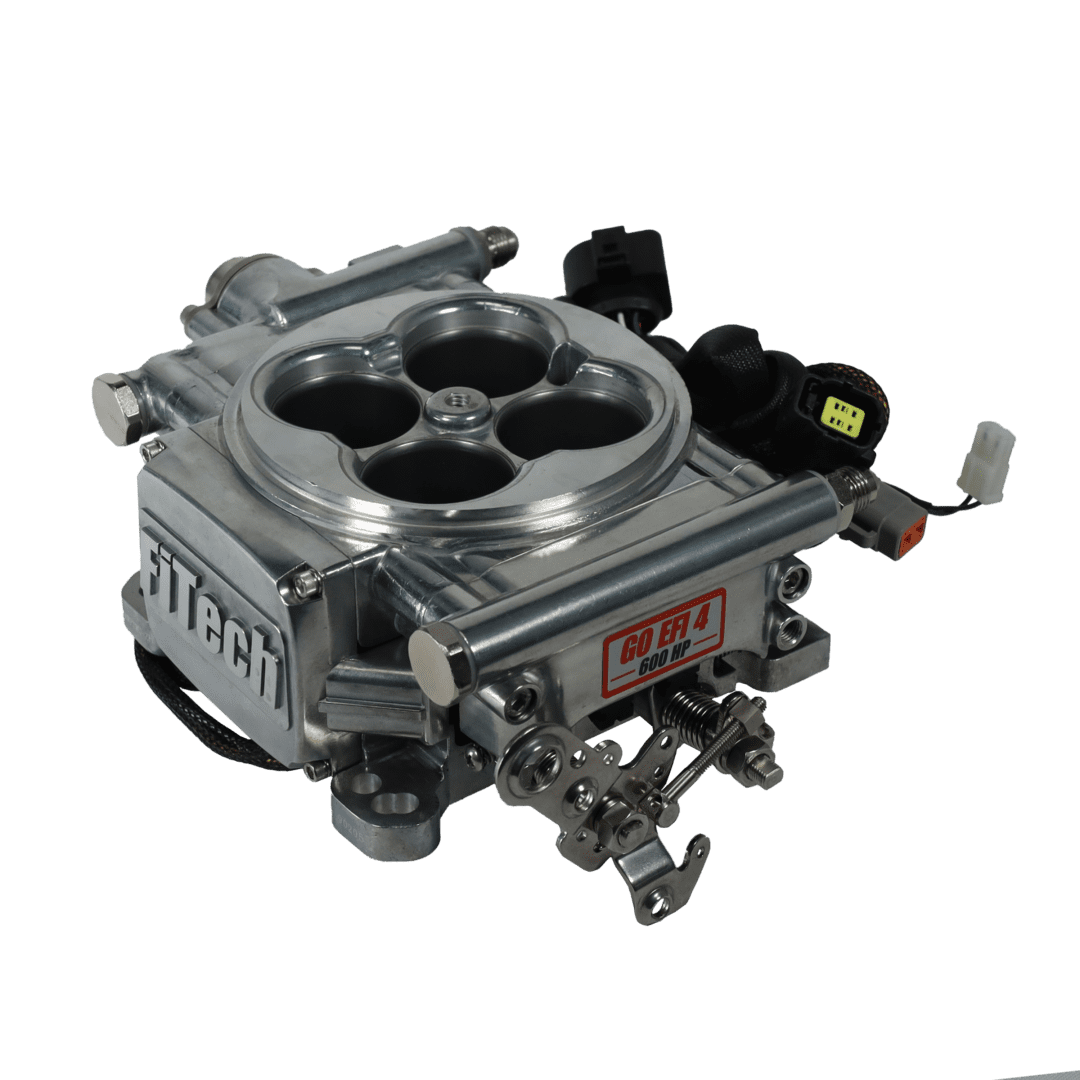 FiTech fuel injection system on black background.