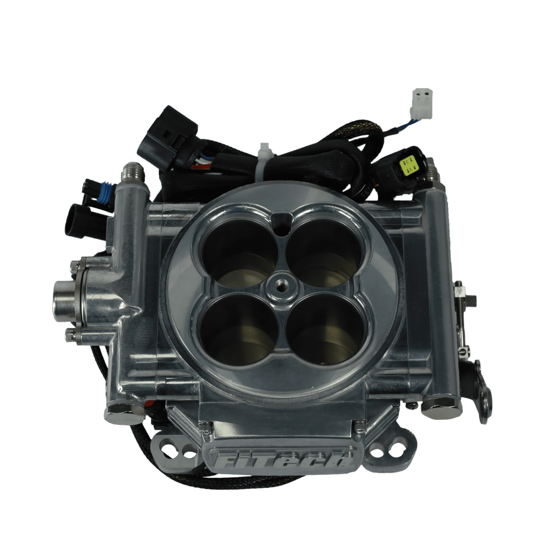 High-performance automotive throttle body on black.