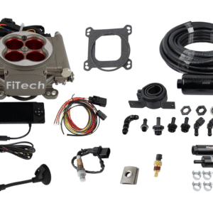 Complete carburetor repair kit with various components and wiring.