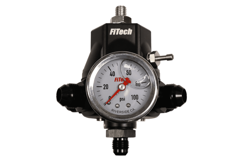 Fuel pressure regulator with gauge, black casing.