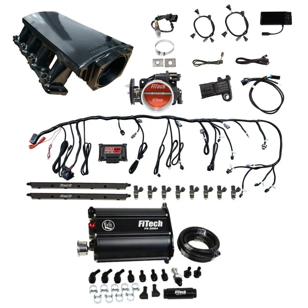 Complete automotive wiring harness kit with connectors and control unit.