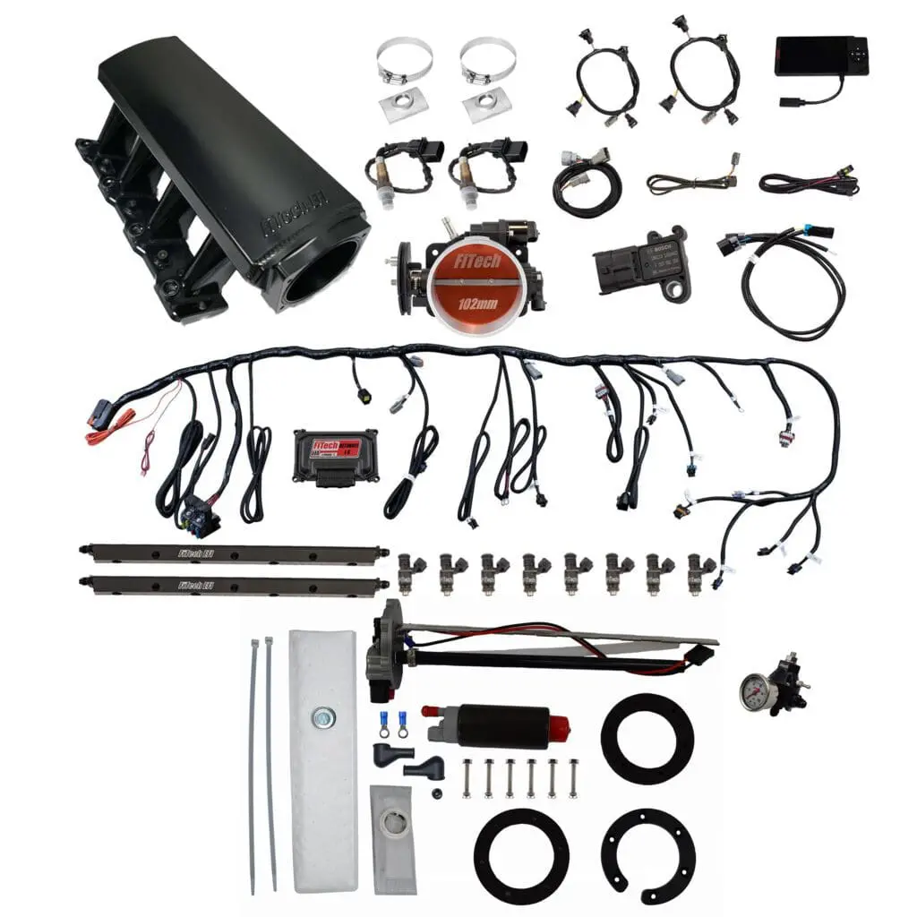 Complete automotive wiring harness kit with connectors and accessories.