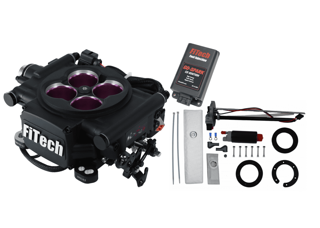 High-performance carburetor with installation kit and accessories.