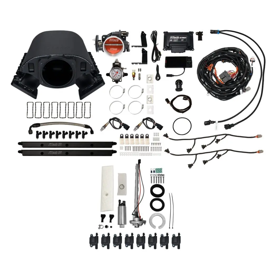 Automotive parts and accessories laid out neatly.