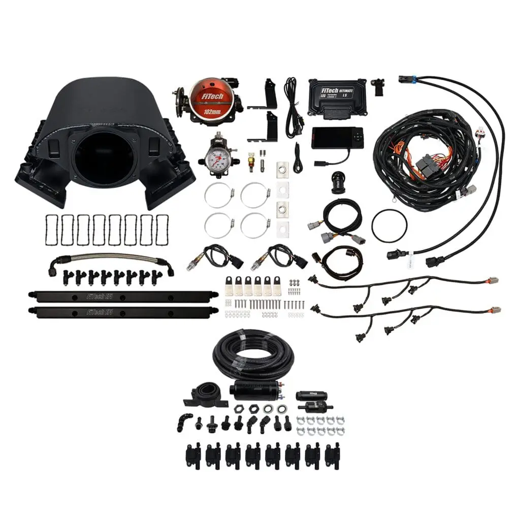 Car engine performance parts kit, assorted components.
