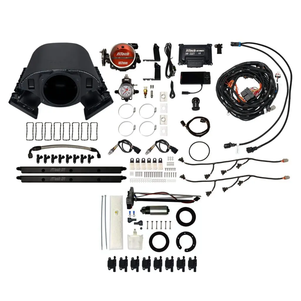 Automotive engine components and wiring kit layout.