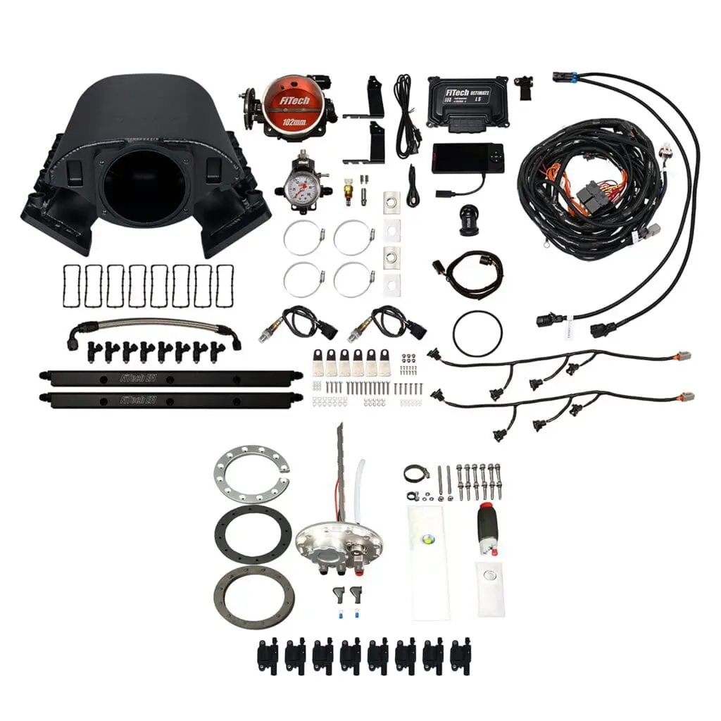 Car engine components and wiring kit displayed.