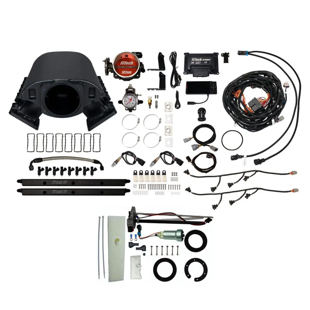 Complete car alarm system kit with sensors and wiring.