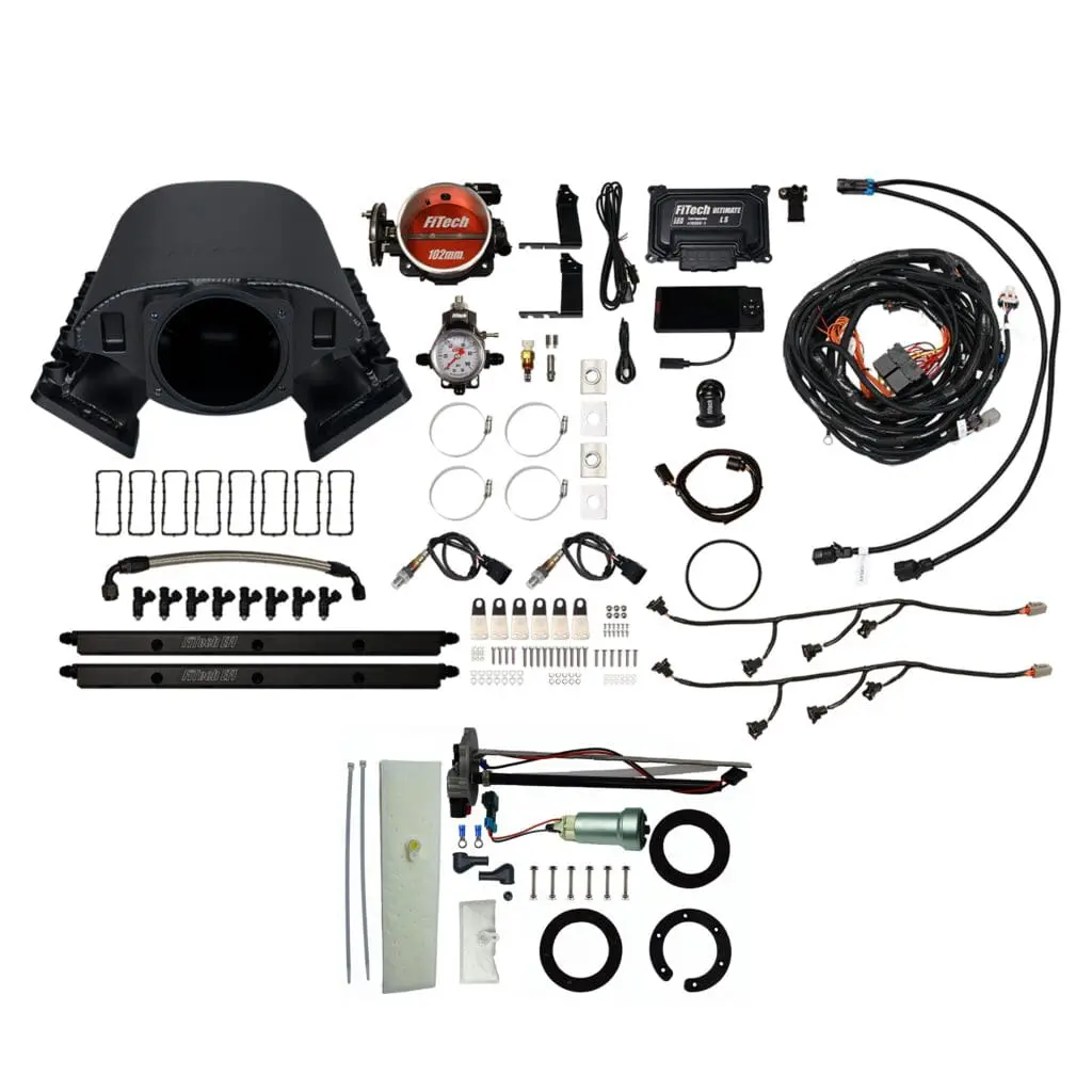 Complete automotive engine wiring harness kit with connectors and components.