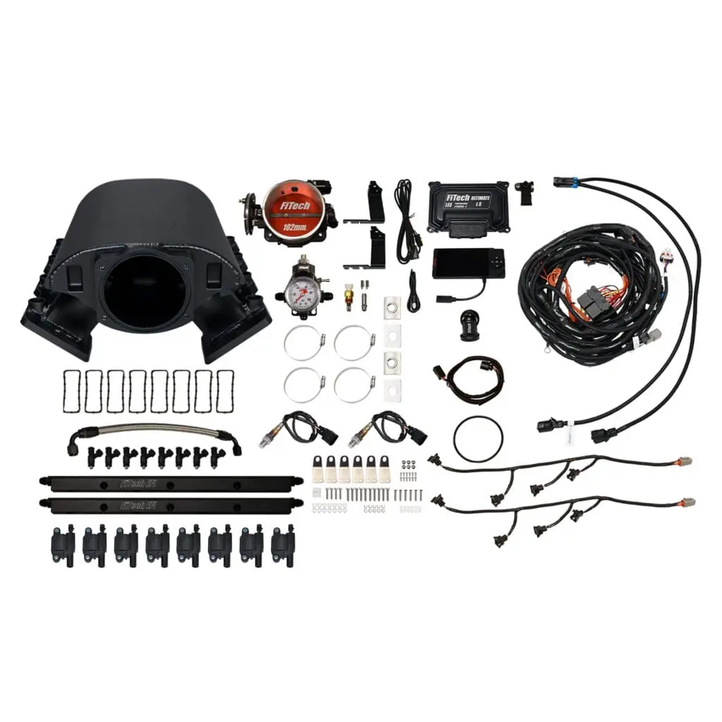 Complete automotive engine wiring harness kit with connectors and cables.