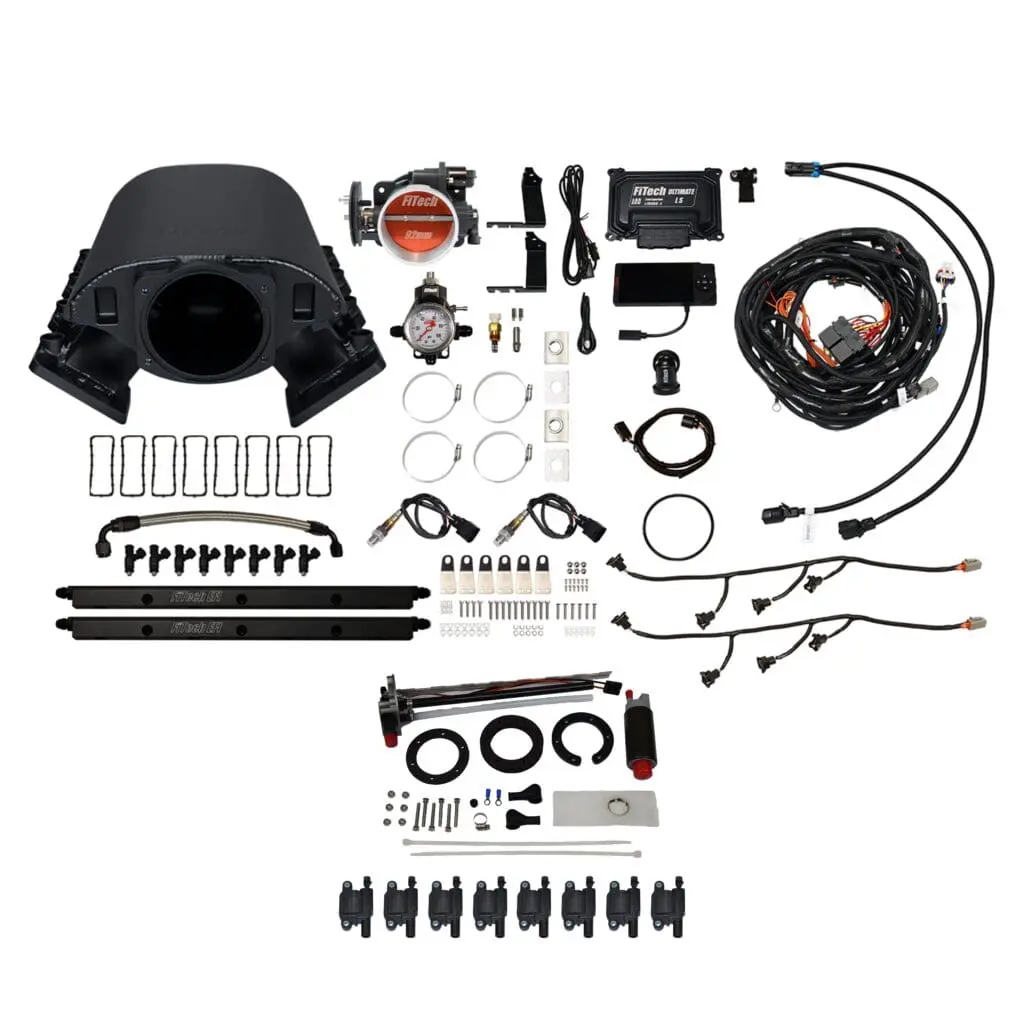 A complete motorcycle carburetor rebuild kit with various components.