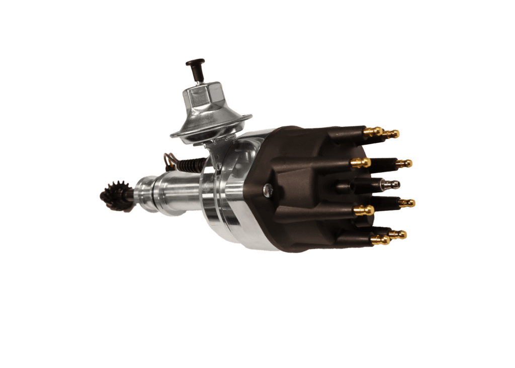 A vintage automotive distributor with multiple brass terminals.