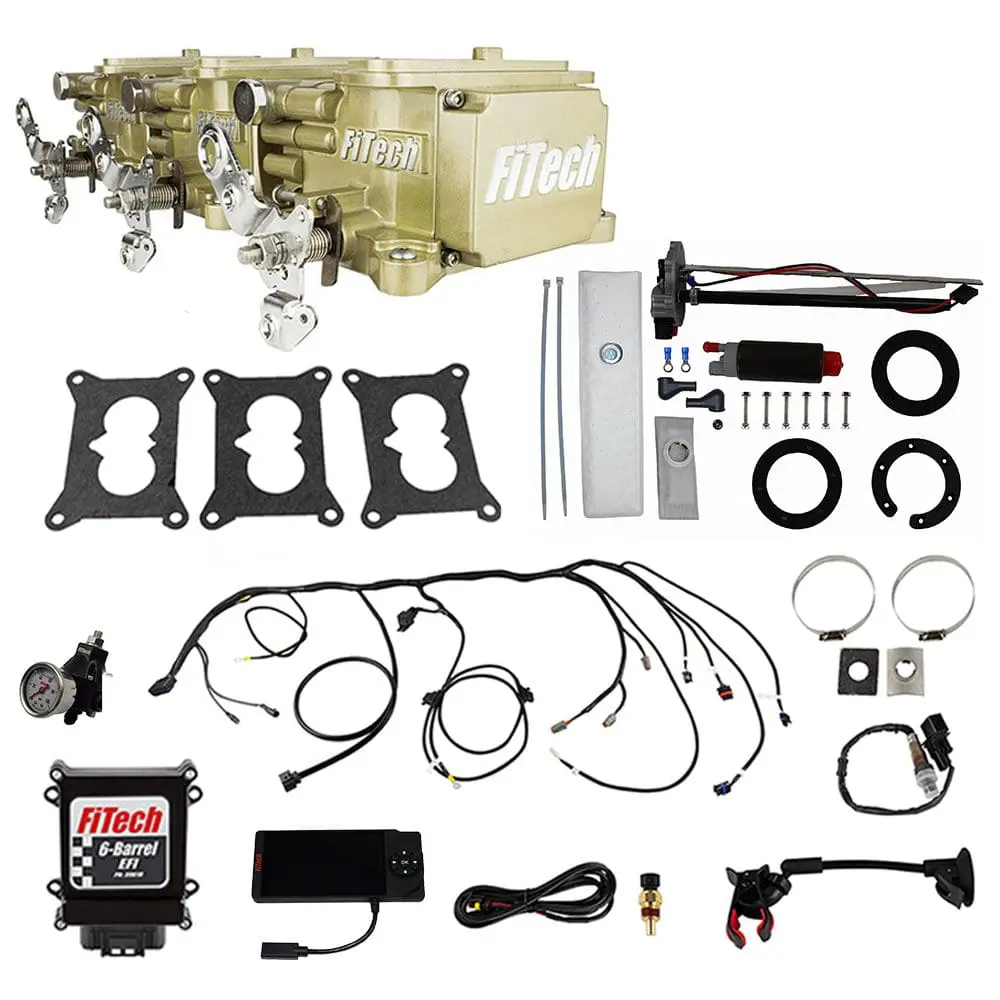 FiTech carburetor kit with various components displayed.
