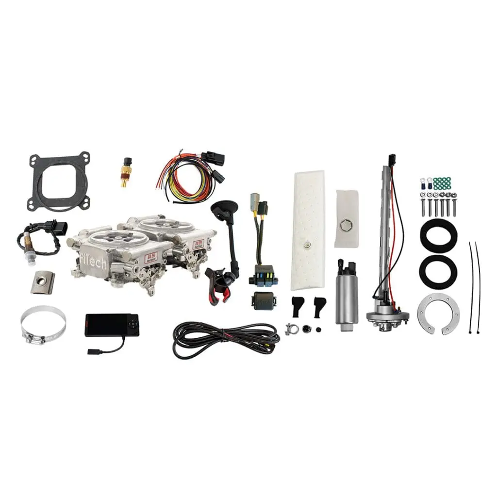 Car engine parts and wiring components.