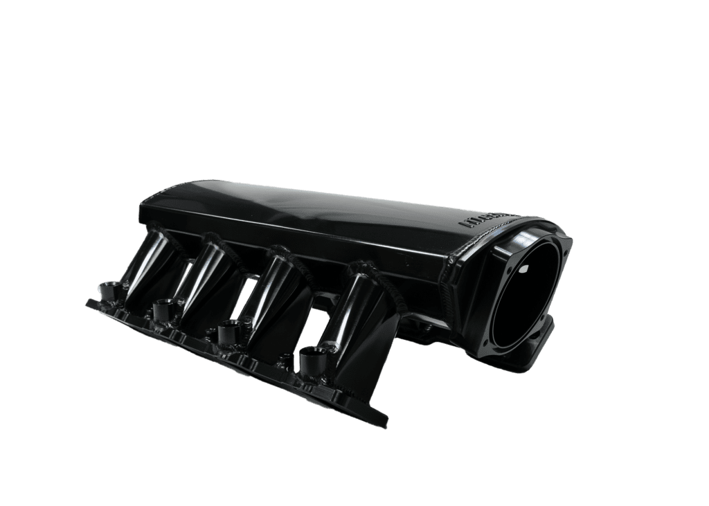 Black car engine intake manifold on black background.