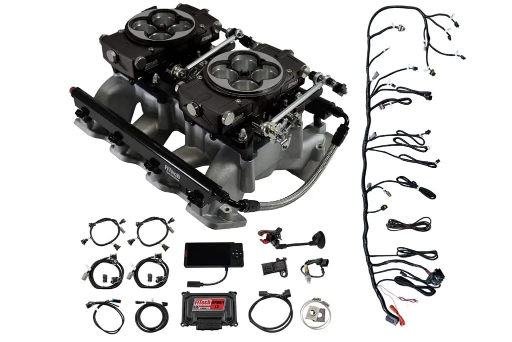 Car engine parts and wiring kit components.