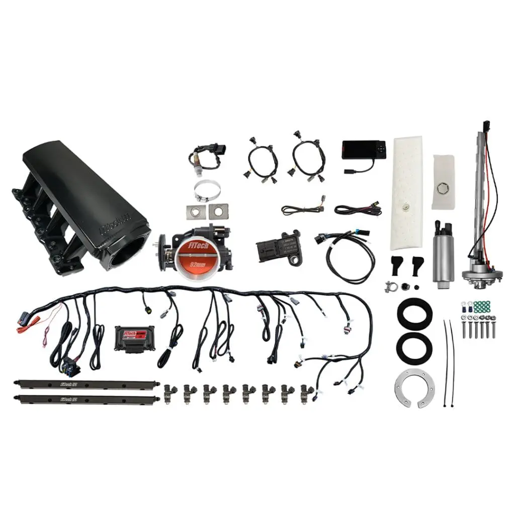 Car engine component kit with various parts.
