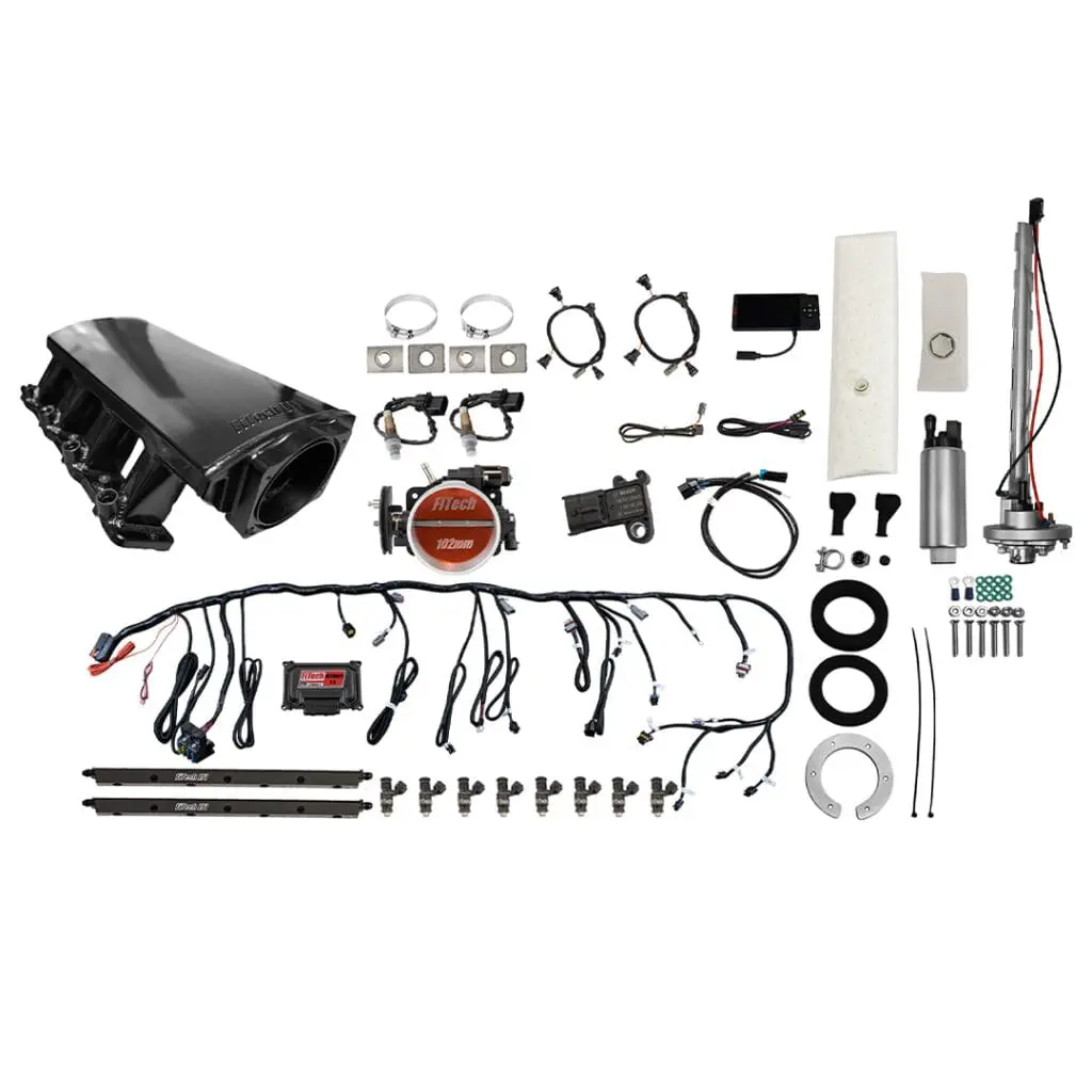 Car engine parts and wiring kit components.