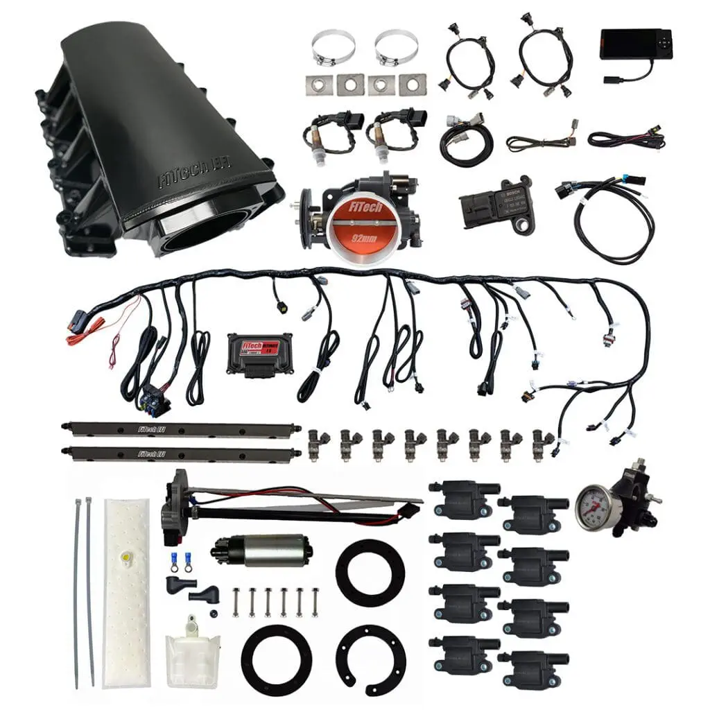 Car engine parts and wiring kit components.