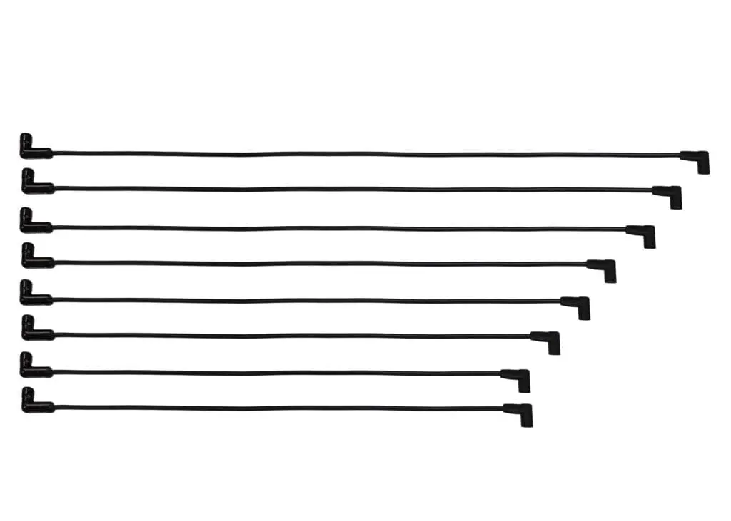 Eight black right-angle guitar patch cables.