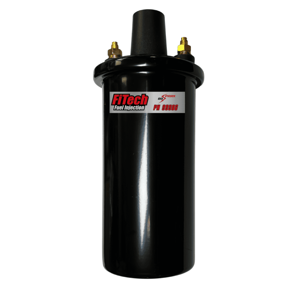 Black automotive ignition coil with label.