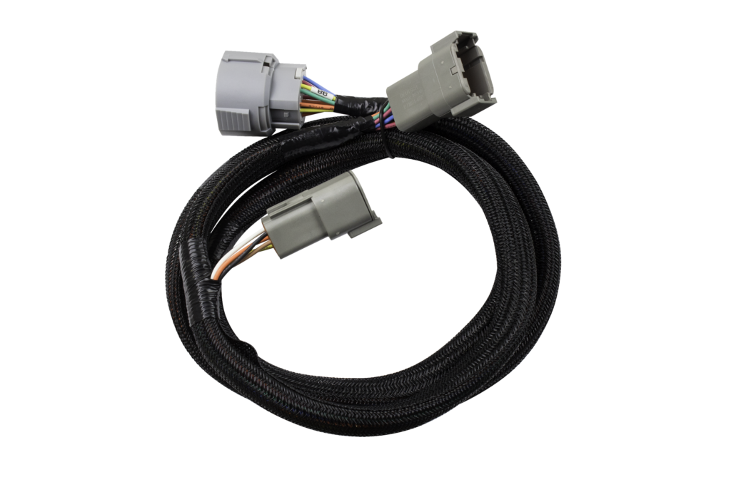 Coiled automotive wiring harness with connectors.