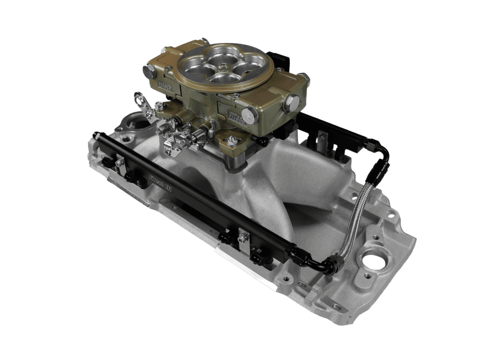 Engine carburetor on black background.