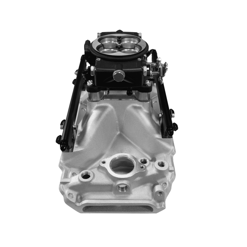 Silver automotive engine component, front view.