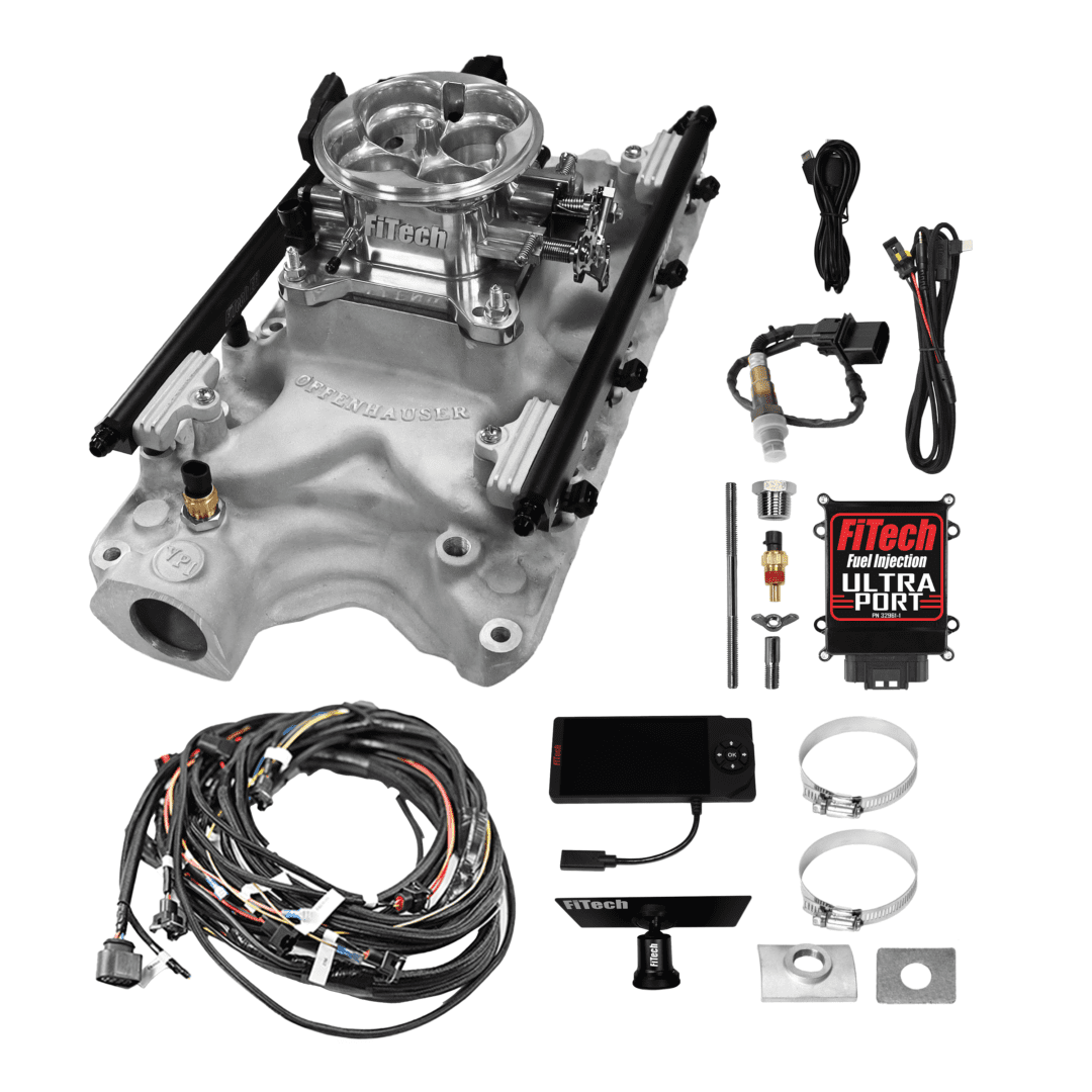 Carburetor and accessories for engine assembly.