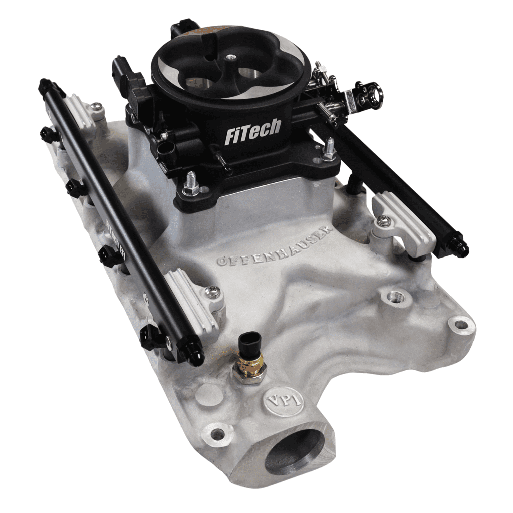 FiTech automotive engine component on display.