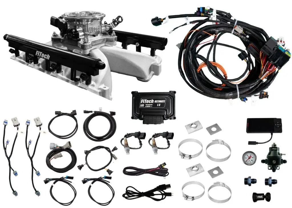 Automotive fuel injection system components and wiring.