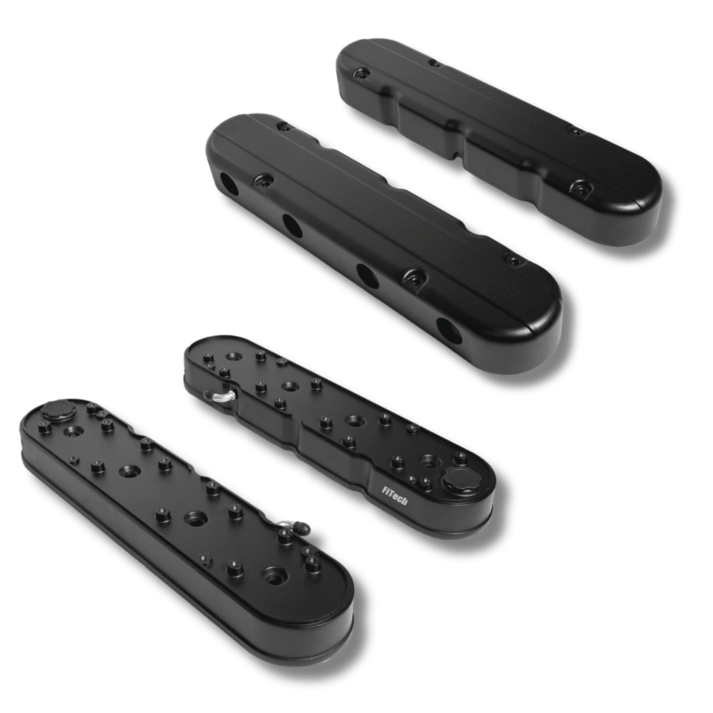 Black rectangular industrial metal components, four pieces.