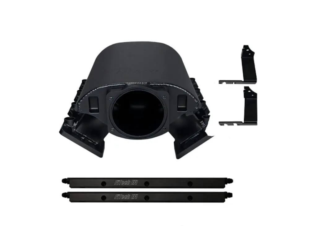 Black car engine intake manifold with brackets.