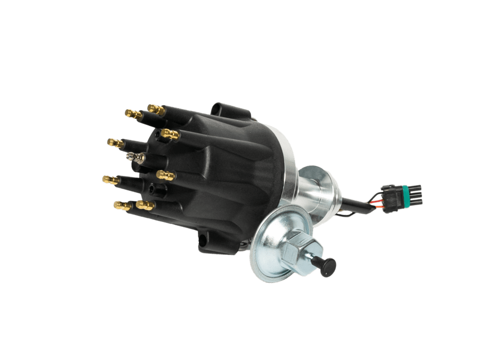 Distributor cap and rotor on black background.
