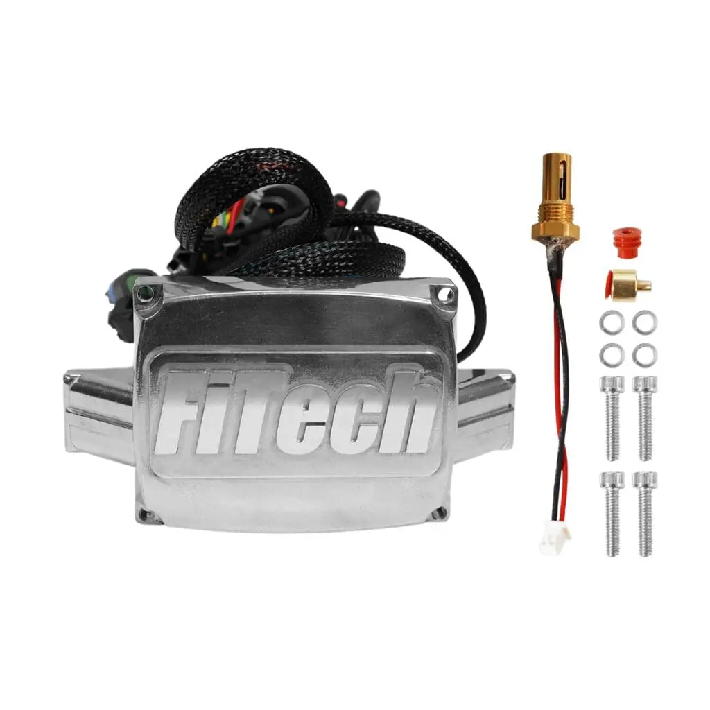 FiTech automotive component with wiring and parts.
