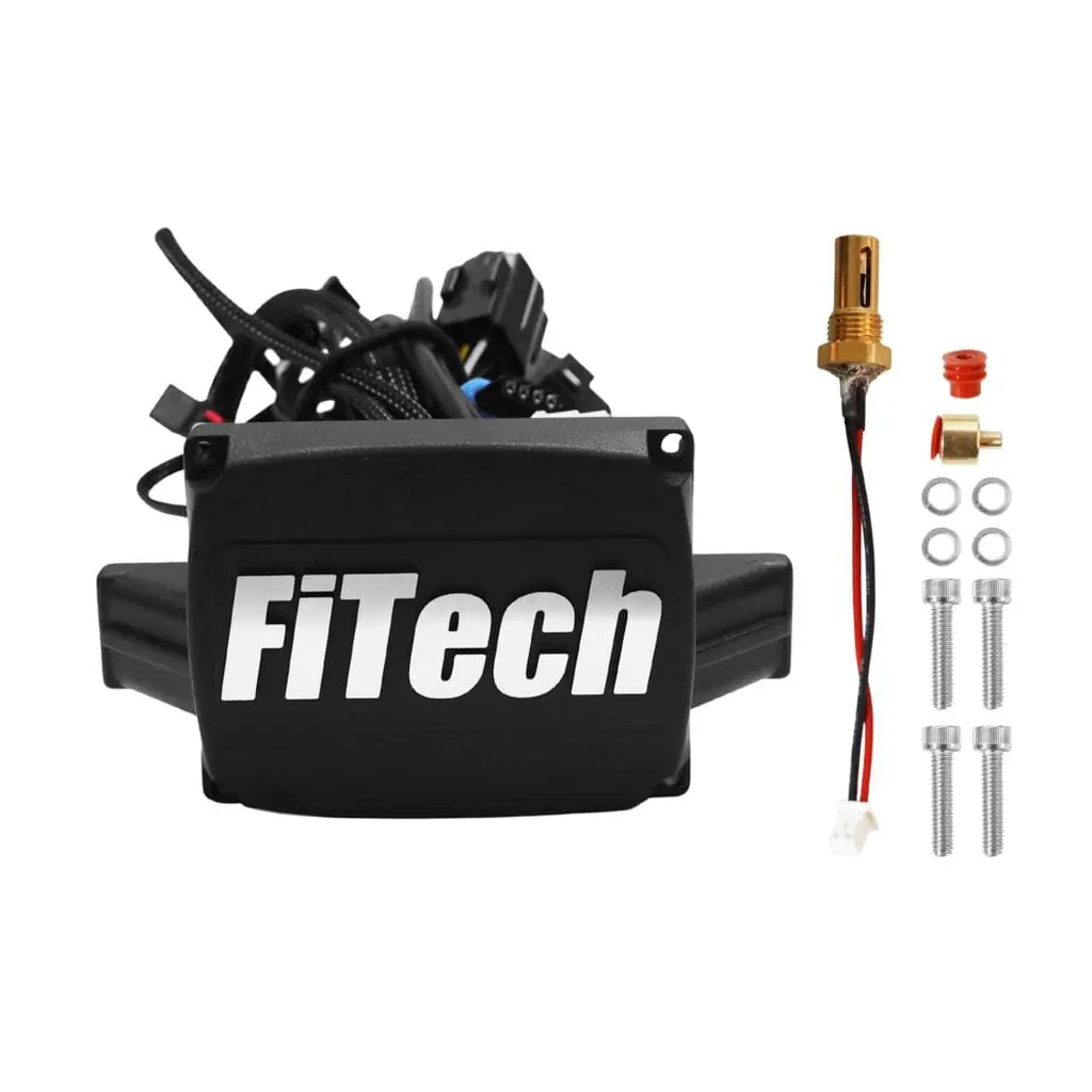 FiTech automotive component with wiring and sensors.