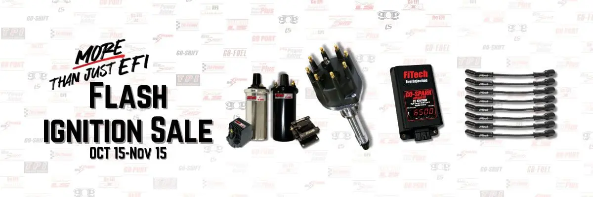 Set of automotive ignition components including coil and distributor.