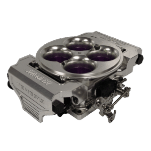 Top view of a high-performance car engine intake manifold with four throttle bodies.