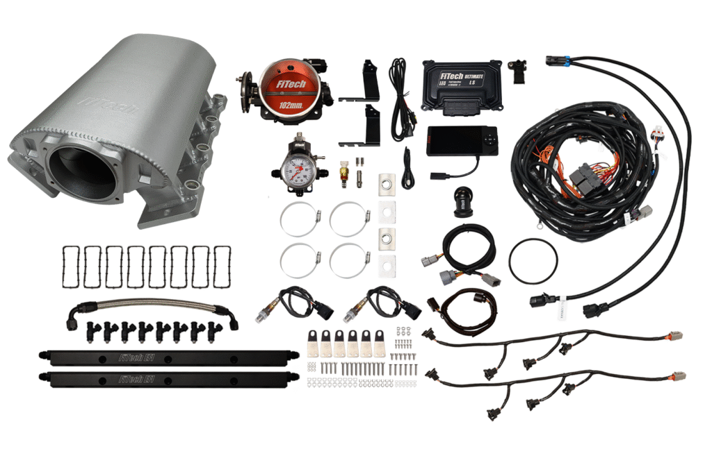 Complete fuel injection kit with wires, sensors, and connectors.