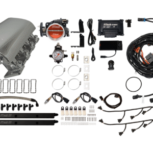 Complete automotive supercharger kit with various components and wiring.