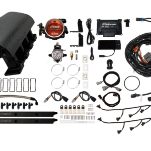 Complete automotive wiring and sensor kit laid out neatly.