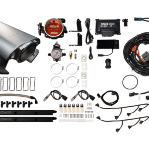 Disassembled automotive turbo kit with various components.