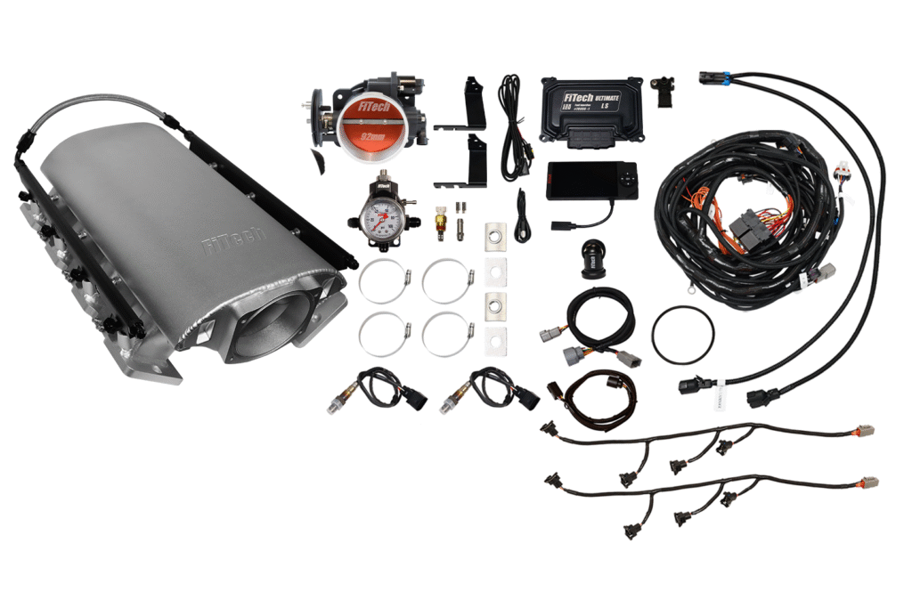 Complete automotive turbocharger installation kit with components and wiring.