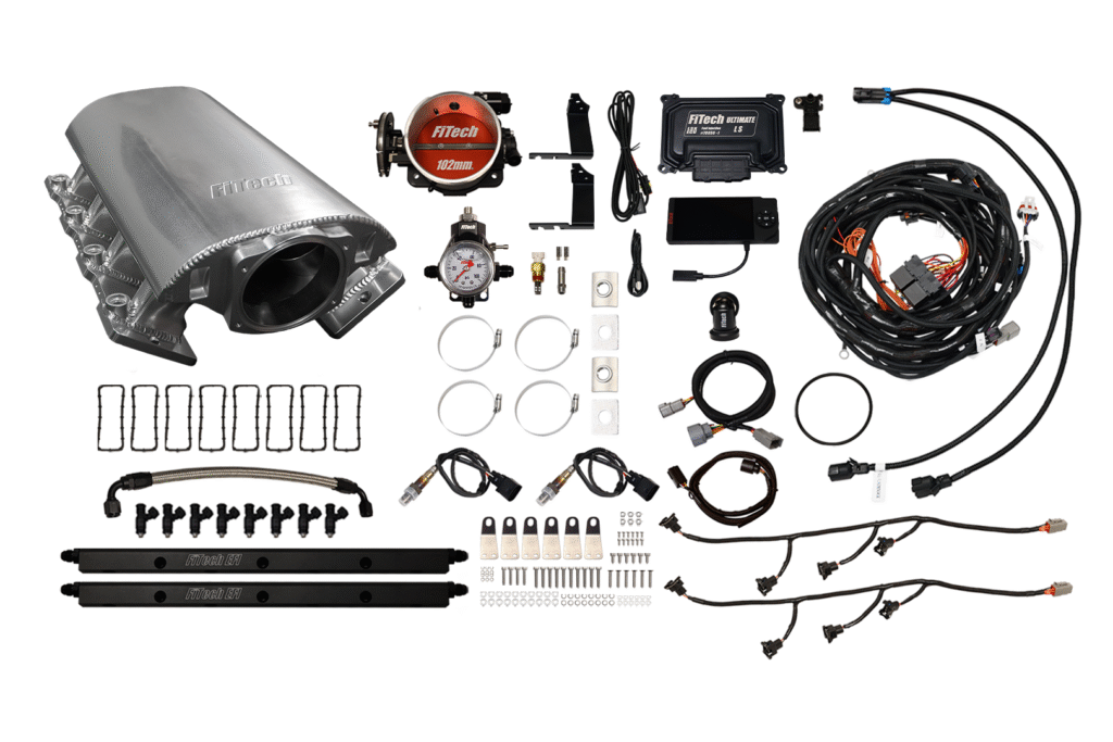 Comprehensive automotive wiring and control kit with various connectors and components.