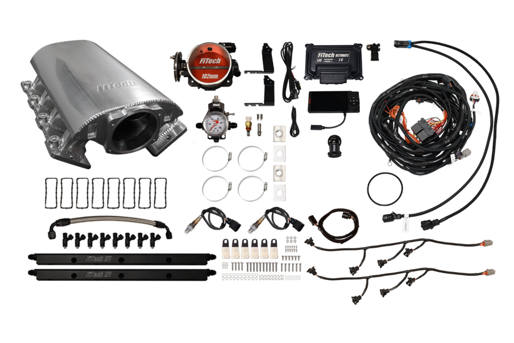 Comprehensive car turbocharger kit with components laid out.