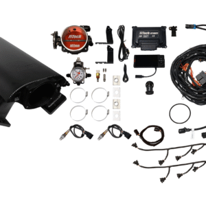 Complete car turbo kit with various components and wiring.
