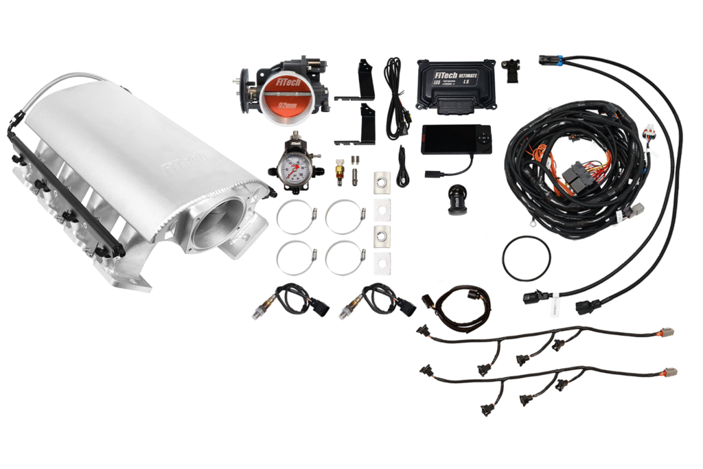 Complete vehicle turbo timer and boost controller kit with wiring and sensors.