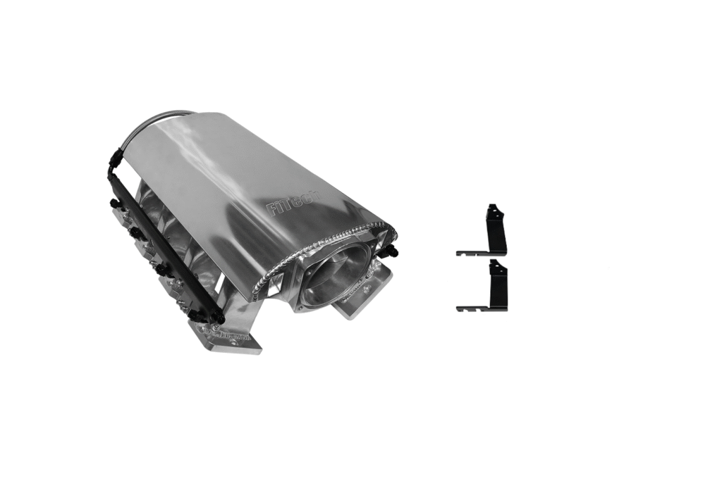 A metal stapler with a detached staple remover on a white background.