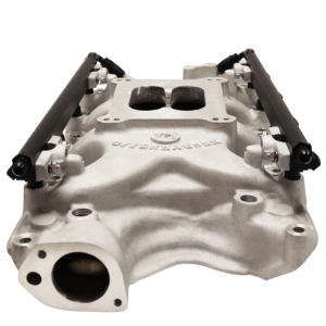 Silver engine intake manifold with fuel rails attached.