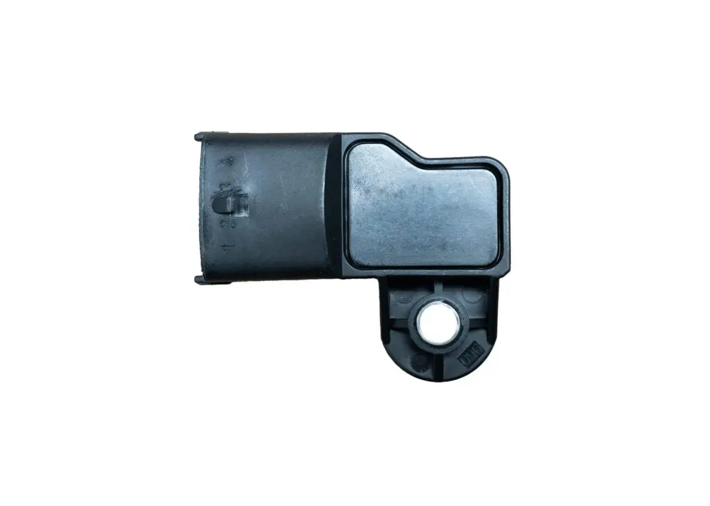 Black plastic automotive sensor with mounting hole.